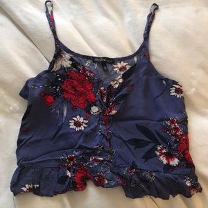 Cute patterned crop top. Never worn. No tag.
